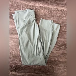 Size 8 Base Pace Lululemon leggings. NWOT. Wrinkles from storage.